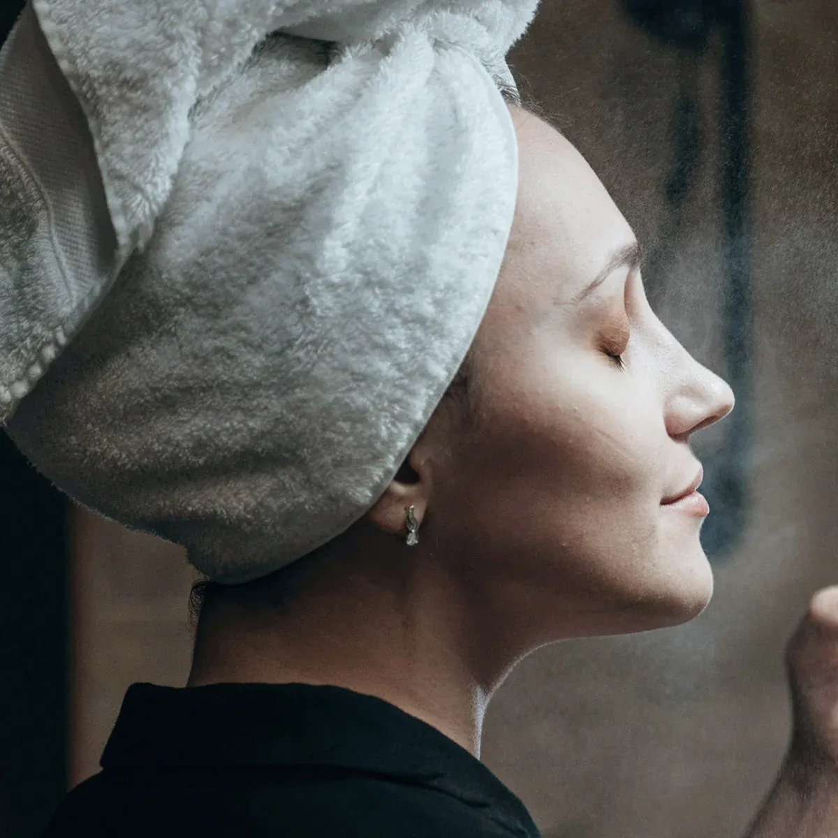 Woman enjoying a facial mist