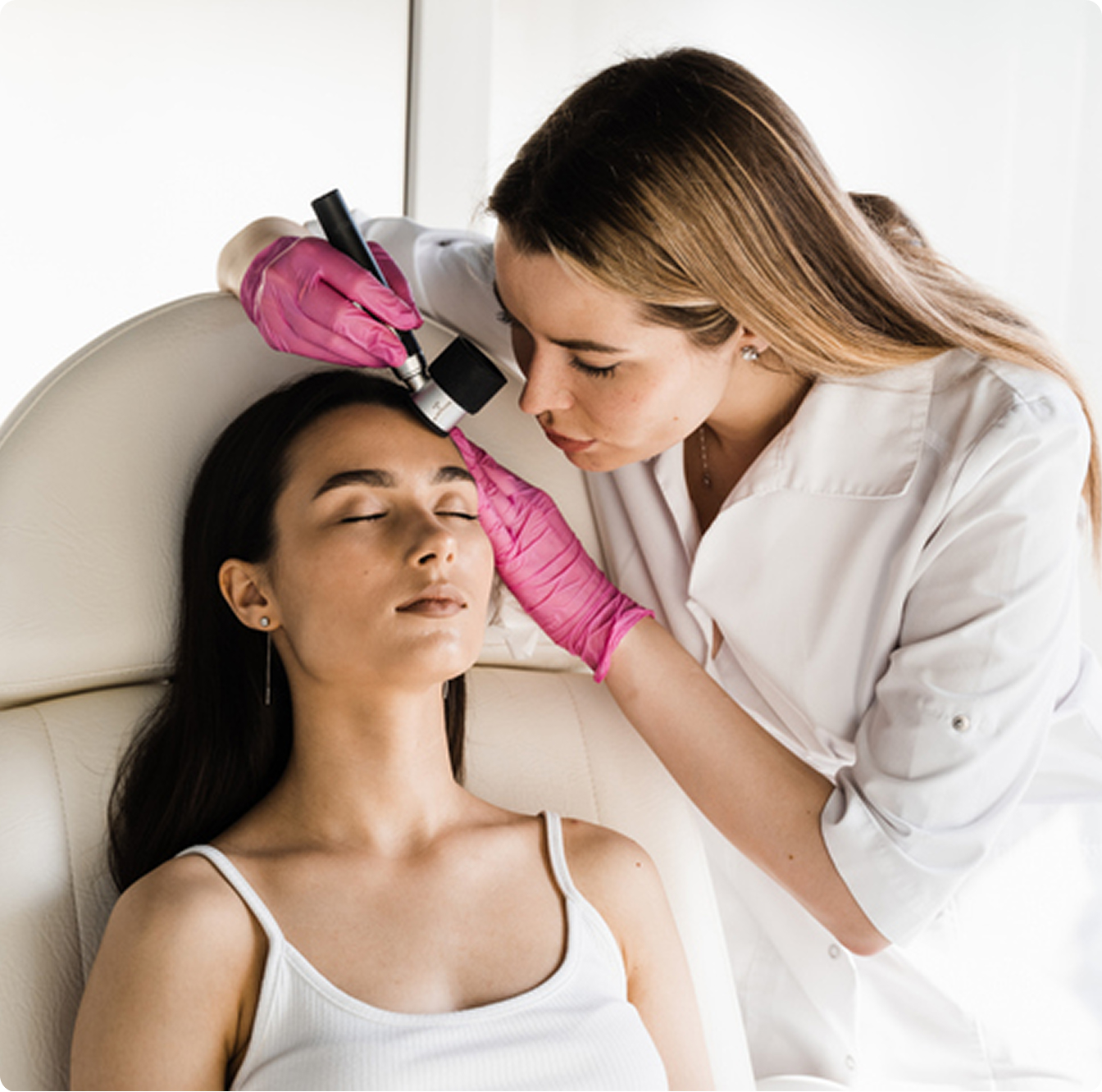 Woman receiving professional makeup application
