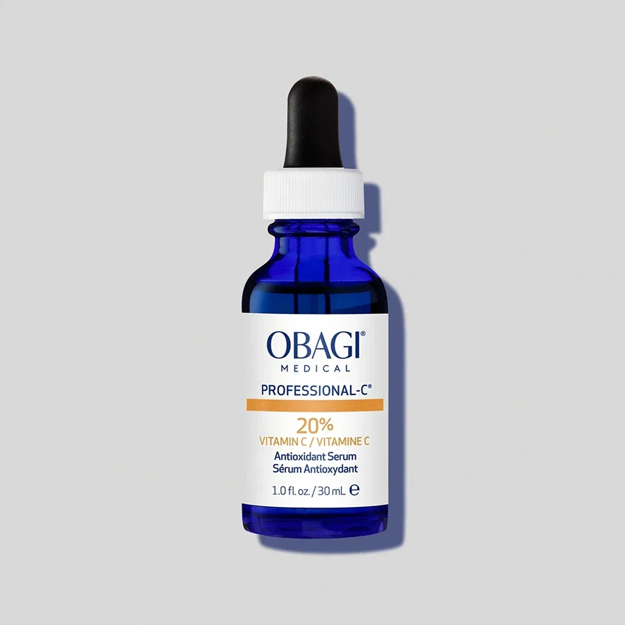 Vitamin C serum in blue dropper bottle