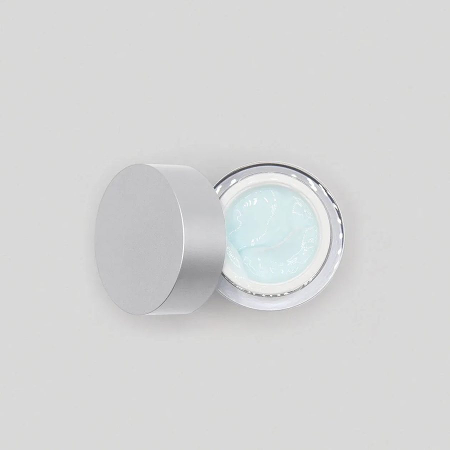 Blue face cream in open container