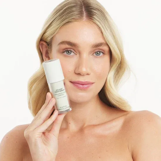 Blonde woman with beauty product